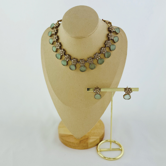 Necklace set with light blue stones. Set includes necklace & earrings. Prefect for Indian weddings, parties and special occasions. Latest 2023 fashion. High end Indian fashion jewellery with top quality stones and beads.