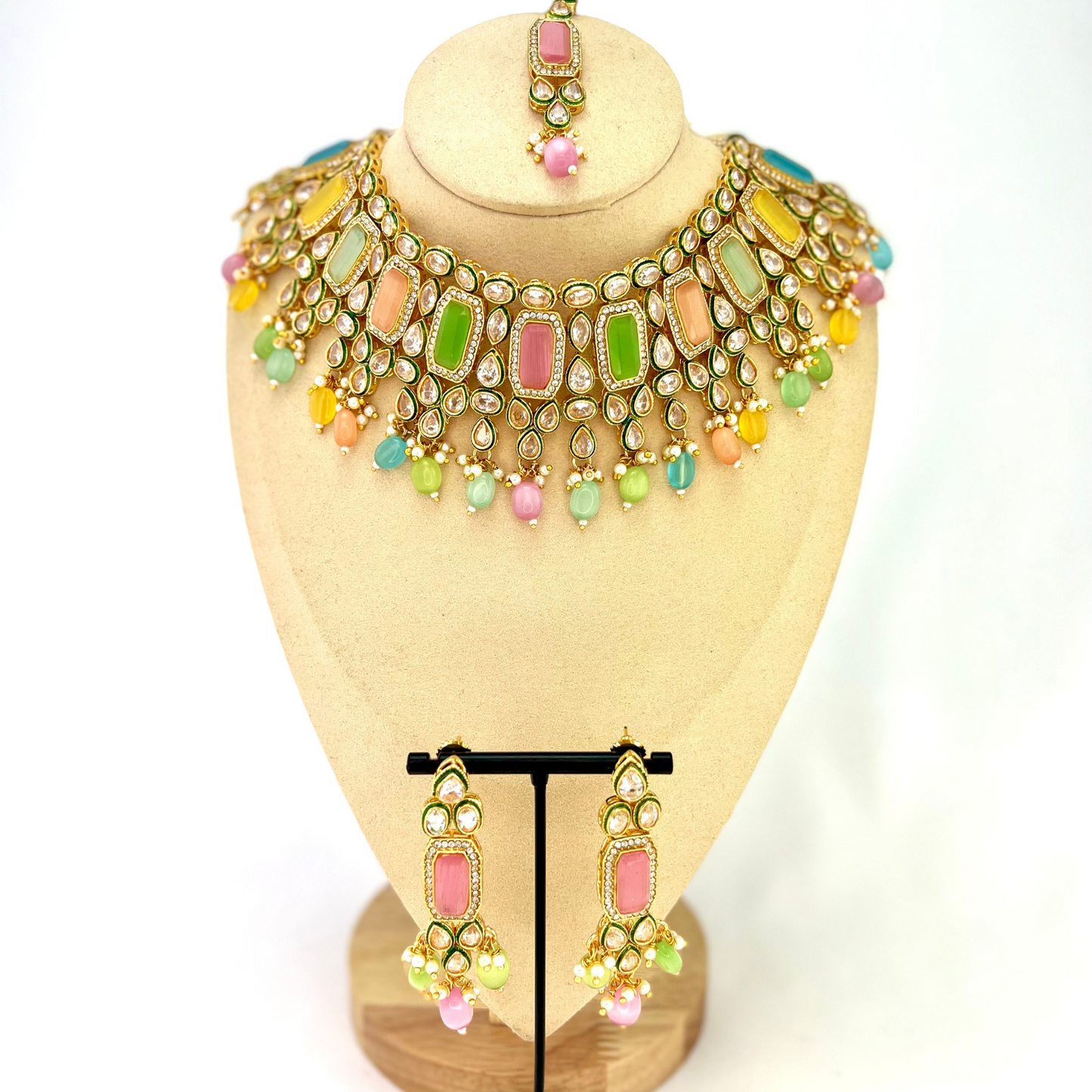 Necklace set with multi colour beads and stones. Set includes necklace, tikka and earrings. Prefect for Indian weddings, parties and special occasions. Latest 2022 fashion. High end Indian fashion jewellery with top quality stones and beads.