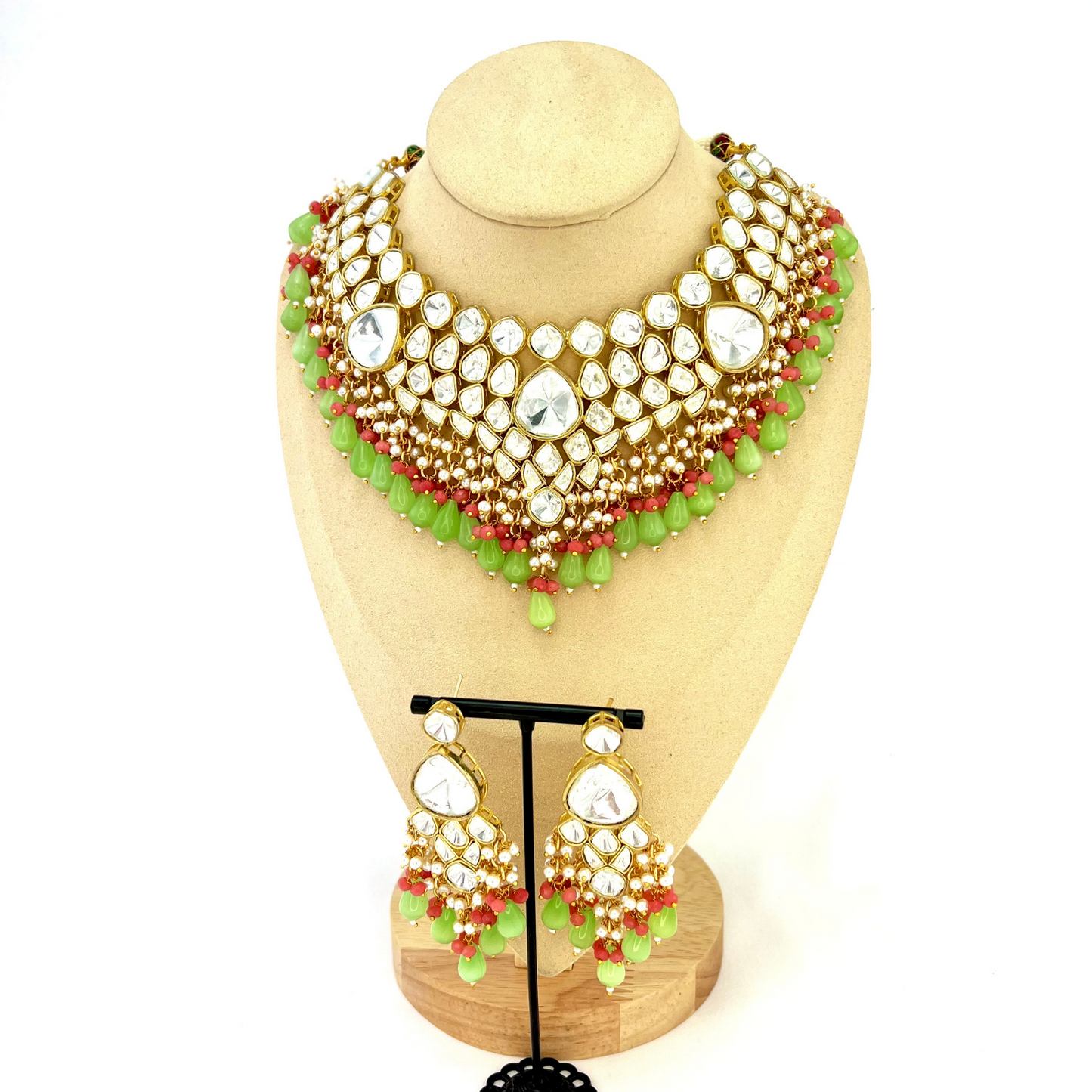 Kundan necklace set with with clear stones, green and pink beads. Set includes necklace and earrings. Prefect for Indian weddings, parties and special occasions. Latest 2022 fashion. High end Indian fashion jewellery with top quality stones and beads.