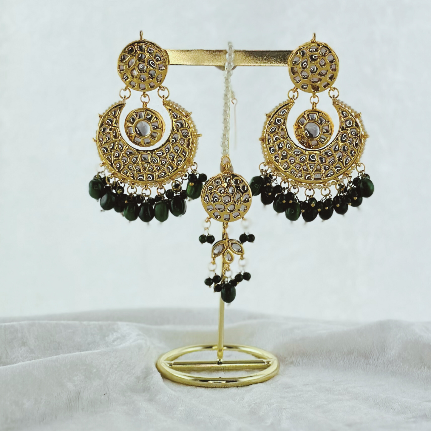 Tikka & earring set in forest green. High quality beads, pearls and stone work. Latest 2023 fashion for weddings, parties and special occasions