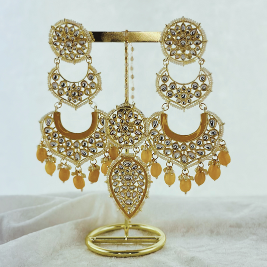 Tikka & Earring Set in yellow. High quality beads, pearls and stone work. Latest 2023 fashion for weddings, parties and special occasions
