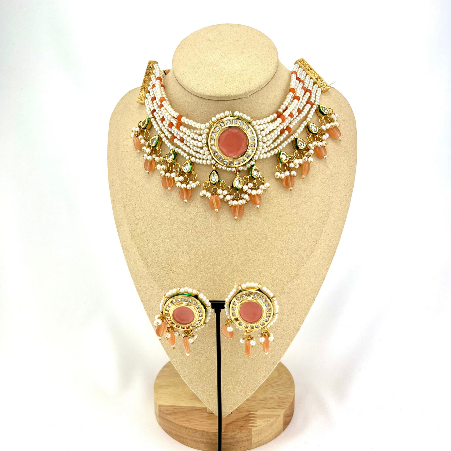 Necklace set with peach beads, stones and white pearl. Set includes necklace and earrings. Prefect for Indian weddings, parties and special occasions. Latest 2022 fashion. High end Indian fashion jewellery with top quality stones and beads.