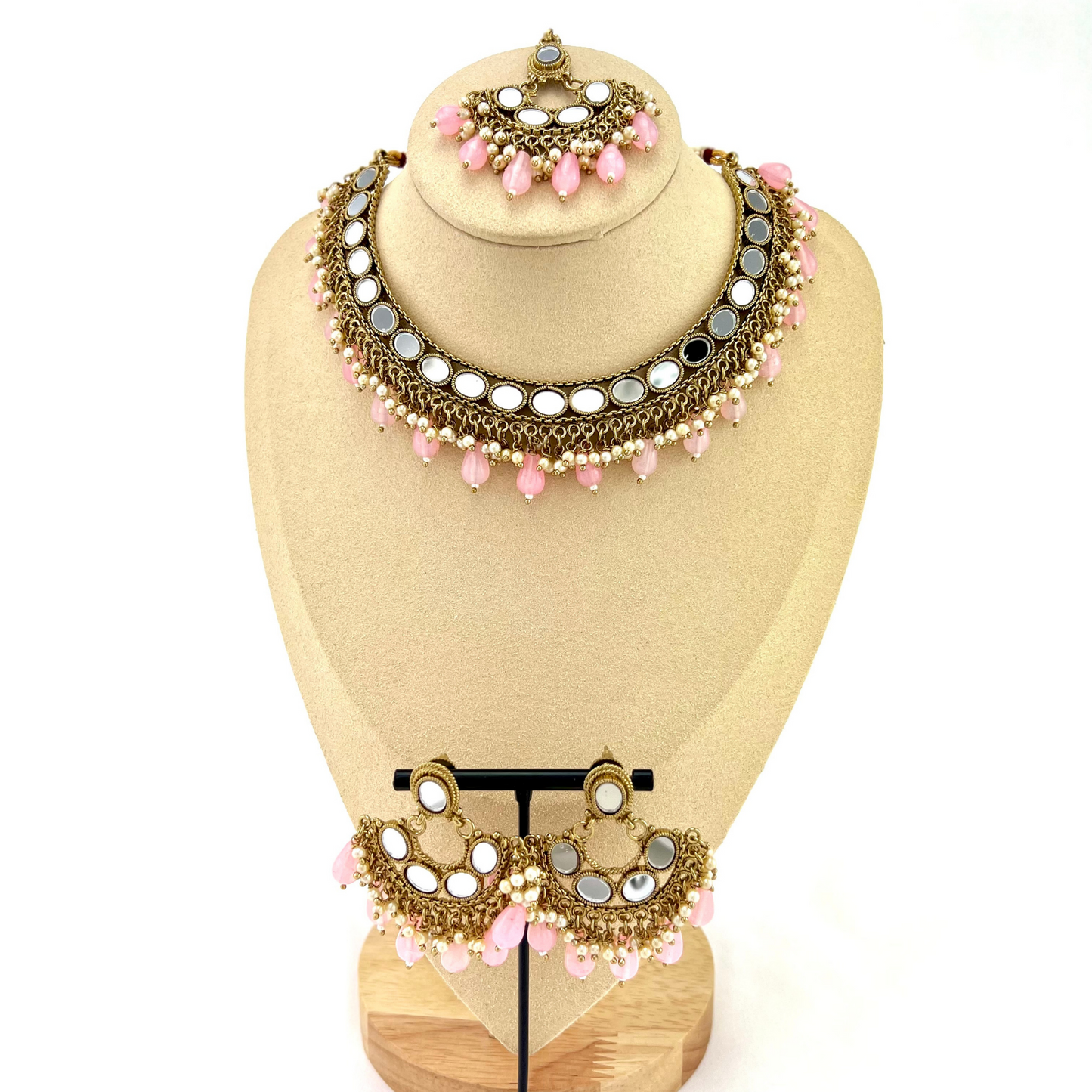 Mirror necklace set with pink beads and small white pearls. Set includes necklace, tikka and earrings. Prefect for Indian parties, weddings and special occasions. Latest 2022 fashion.