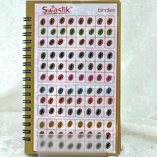 Bindi Book with gold stone work in various different shapes, sizes and colours. Prefect for Indian weddings, parties and special occasions.