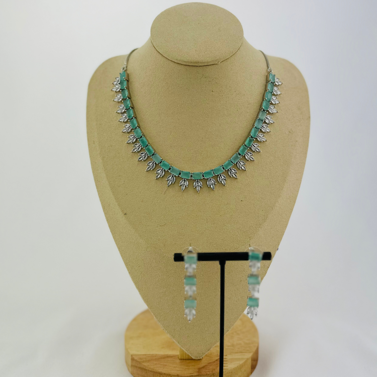 Necklace set with light blue and clear stones. Set includes necklace & earrings. Prefect for Indian weddings, parties and special occasions. Latest 2023 fashion. High end Indian fashion jewellery with top quality stones and beads.