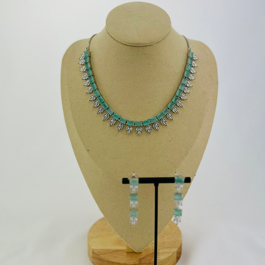Necklace set with light blue and clear stones. Set includes necklace & earrings. Prefect for Indian weddings, parties and special occasions. Latest 2023 fashion. High end Indian fashion jewellery with top quality stones and beads.