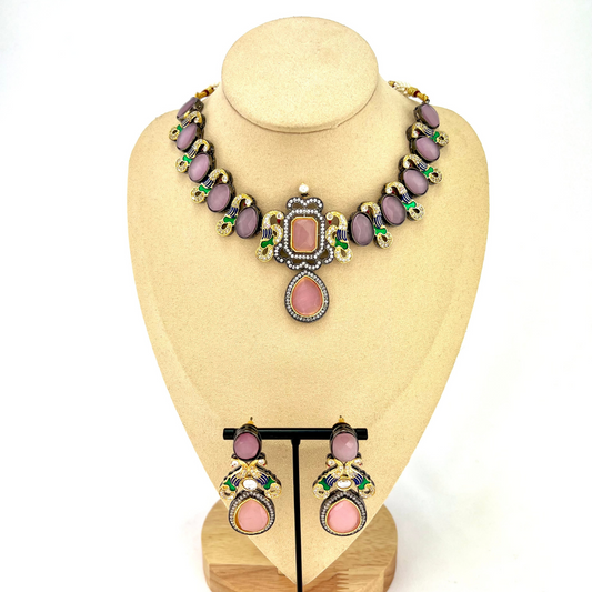 Necklace set with pink and purple clear stone work. Set includes necklace and earrings. Prefect for Indian weddings, parties and special occasions. Latest 2022 fashion. High end Indian fashion jewellery with top quality stones and beads.