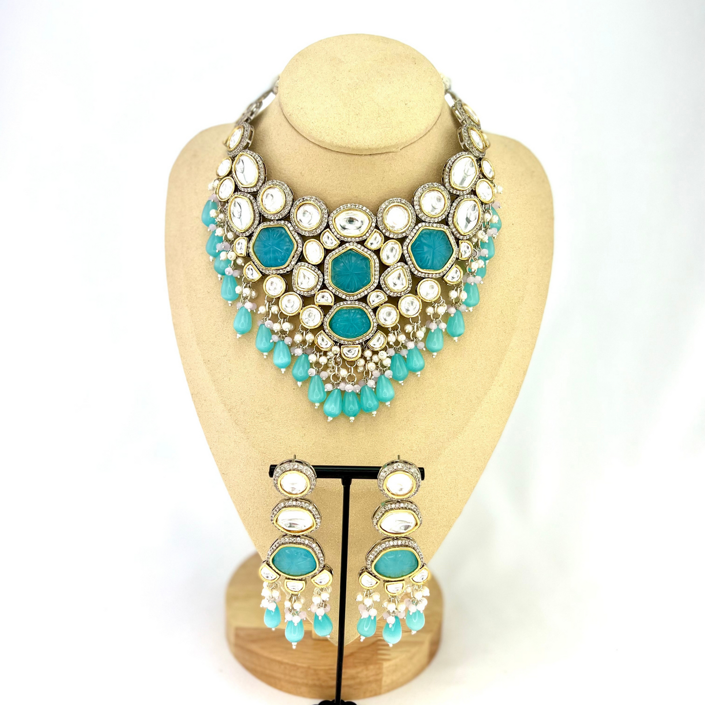Kundan necklace set with with clear and blue stones, blue beads and small white pearls. Set includes necklace and earrings. Prefect for Indian weddings, parties and special occasions. Latest 2022 fashion. High end Indian fashion jewellery with top quality stones and beads.