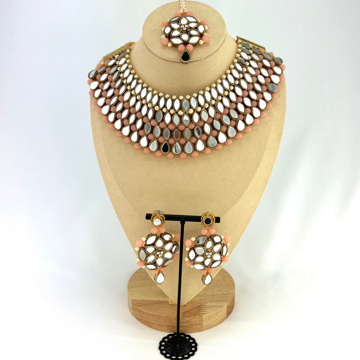 Mirror necklace set with pink beads, clear stones and pearls. Set includes, necklace, tikka and earrings. Prefect for Indian weddings, parties and special occasions. Latest 2022 fashion. High end Indian fashion jewellery with top quality stones and beads.