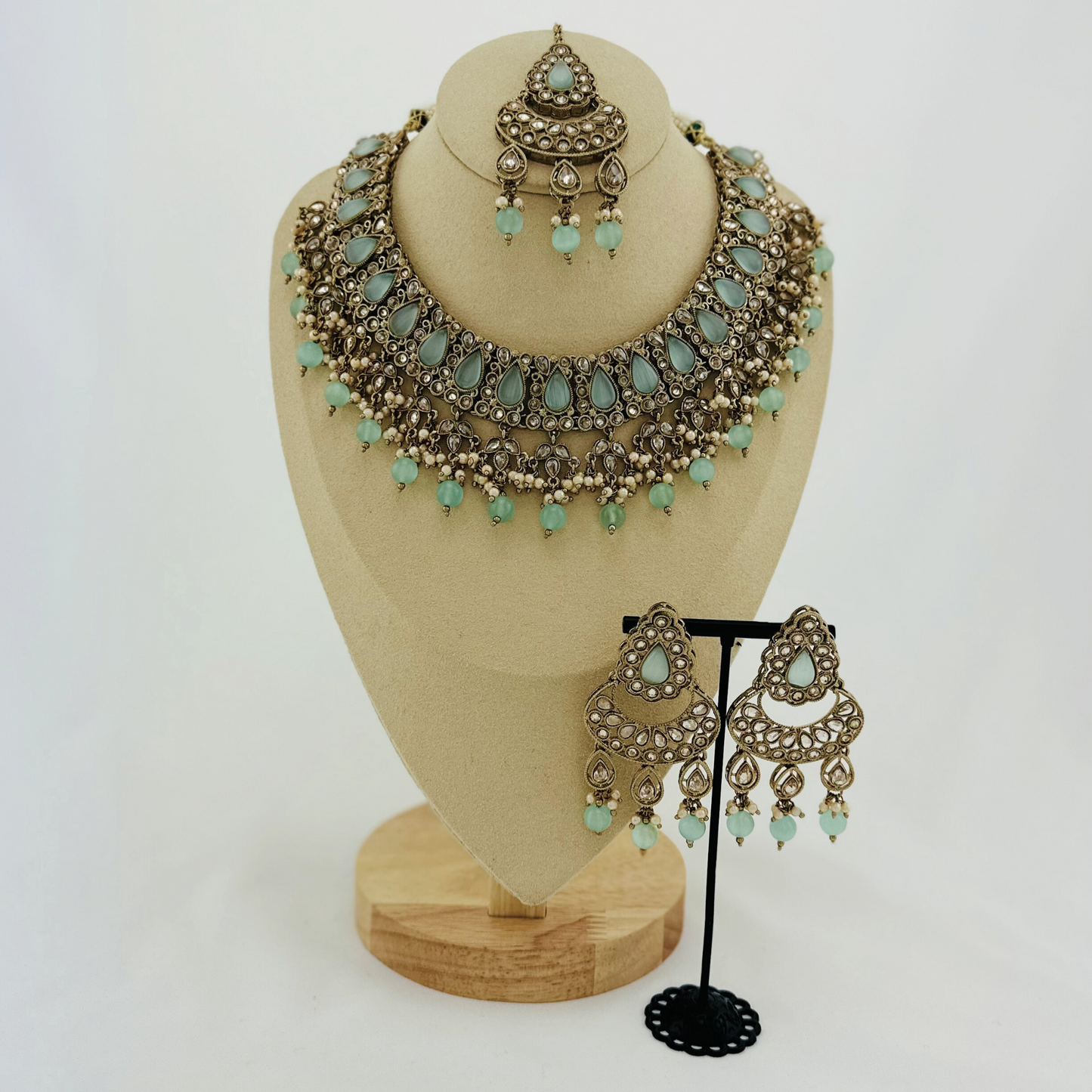 Necklace set with light blue beads and stone. Set includes necklace, tikka & earrings. Prefect for Indian weddings, parties and special occasions. Latest 2023 fashion. High end Indian fashion jewellery with top quality stones and beads.