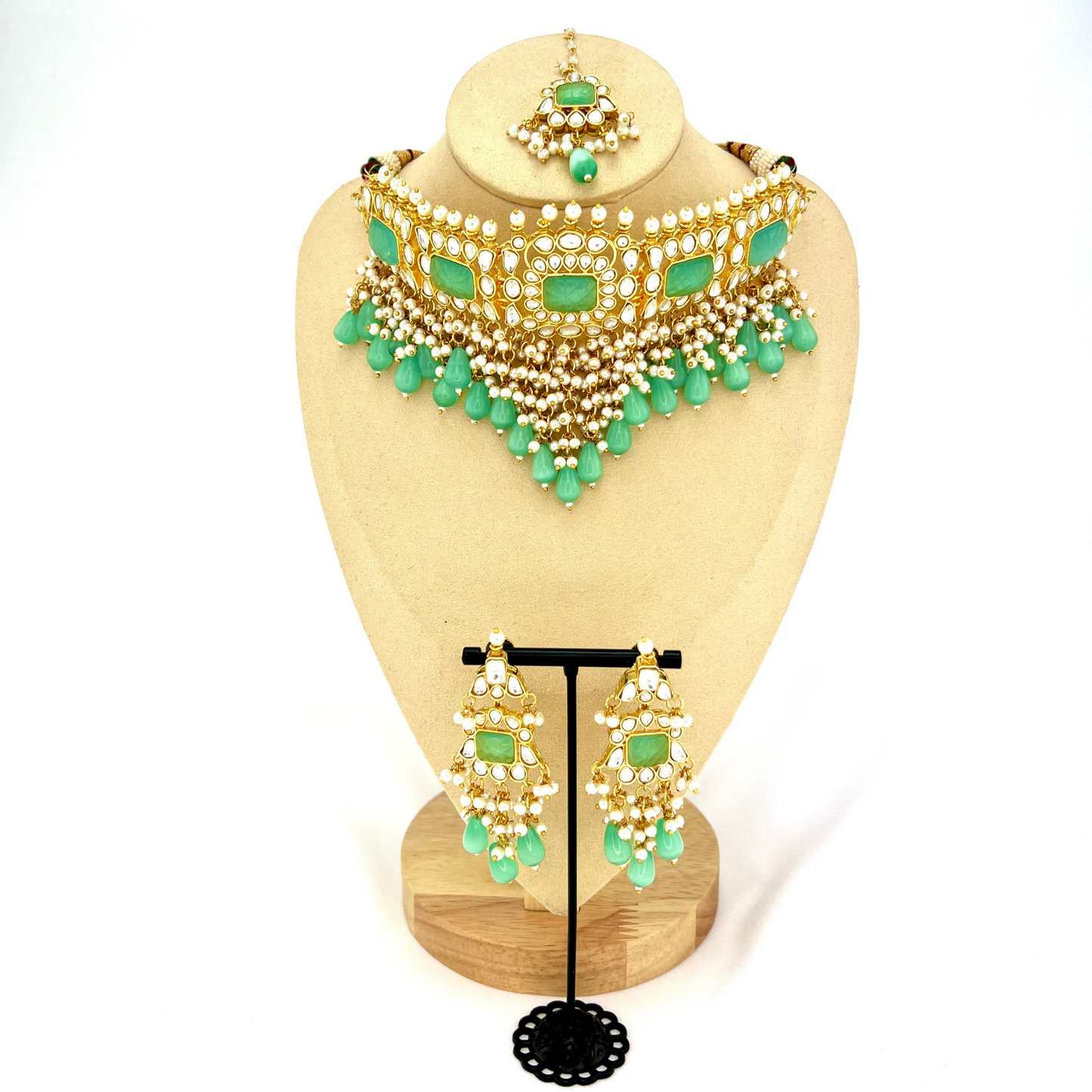 Necklace set with turquoise beads and stones, finished with small white pearls. Set includes necklace, tikka and earrings. Prefect for Indian weddings, parties and special occasions. Latest 2022 fashion. High end Indian fashion jewellery with top quality stones and beads.