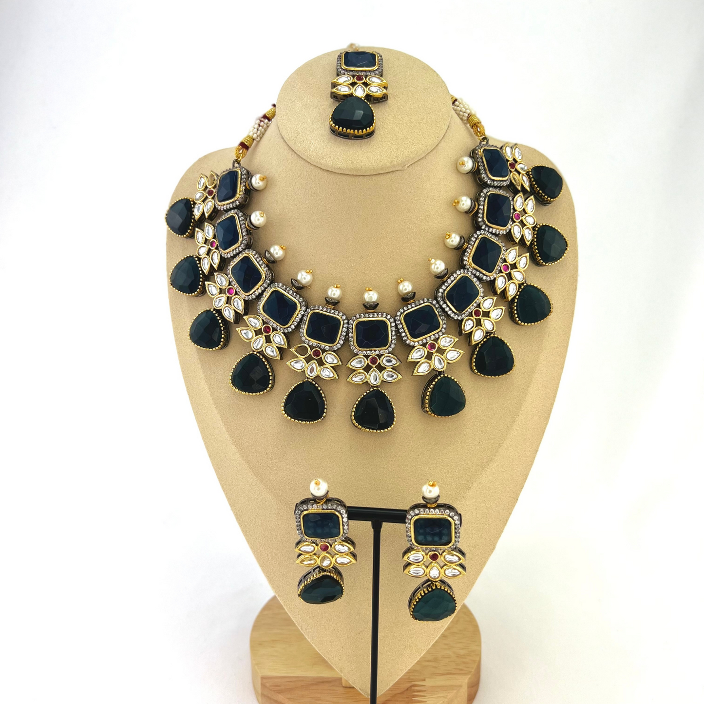 Necklace set with Navy and silver stone work finished with small white pearls. Set includes necklace, tikka and earrings. Prefect for Indian parties, weddings and special occasions. Latest 2022 fashion