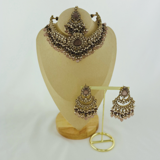 Choker set with lilac stones pearl beads. Set includes necklace, tikka & earrings. Prefect for Indian weddings, parties and special occasions. Latest 2023 fashion. High end Indian fashion jewellery with top quality stones and beads.