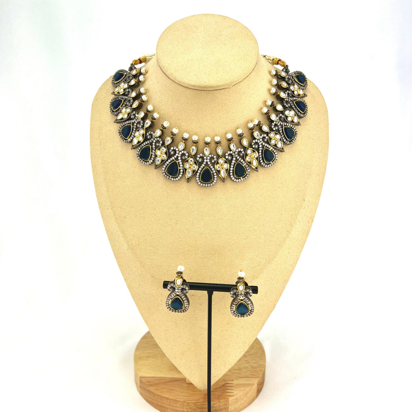 Necklace set with navy blue and clear stone work. Set includes necklace and earrings. Prefect for Indian weddings, parties and special occasions. Latest 2022 fashion. High end Indian fashion jewellery with top quality stones and beads.