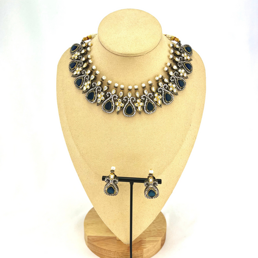 Necklace set with navy blue and clear stone work. Set includes necklace and earrings. Prefect for Indian weddings, parties and special occasions. Latest 2022 fashion. High end Indian fashion jewellery with top quality stones and beads.