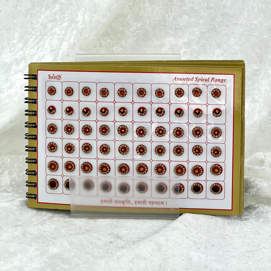 Bindi Book with gold stone work in round shape in various different sizes and colours. Prefect for Indian weddings, parties and special occasions.