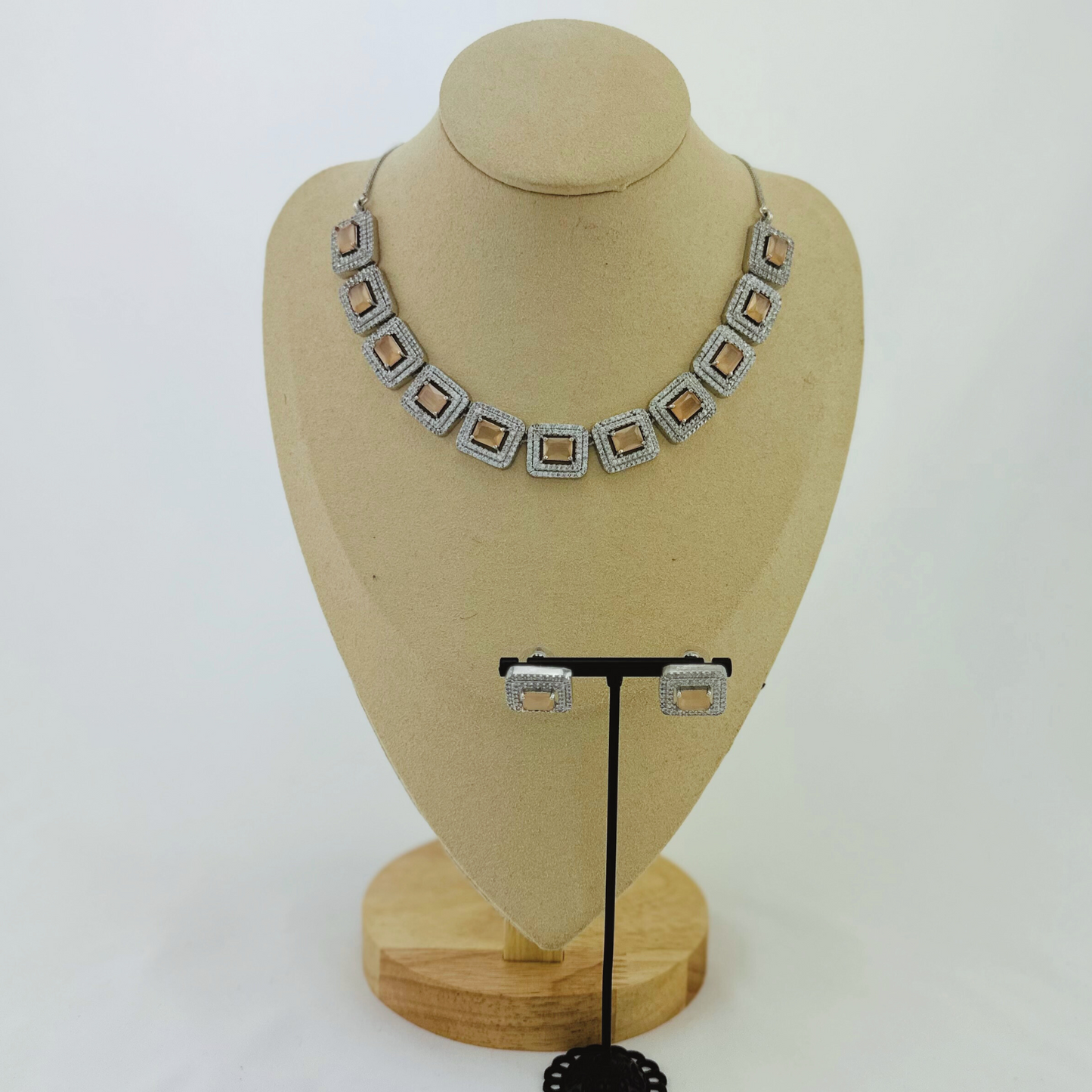 Necklace set with peach and clear stones. Set includes necklace & earrings. Prefect for Indian weddings, parties and special occasions. Latest 2023 fashion. High end Indian fashion jewellery with top quality stones and beads.
