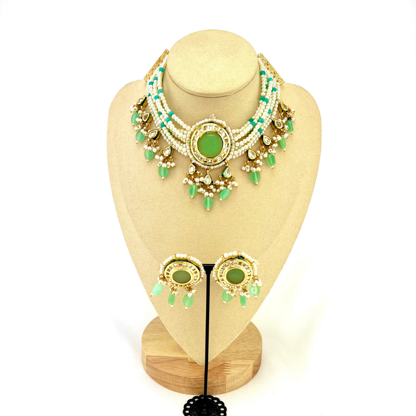 Necklace set with green beads, stones and white pearl. Set includes necklace and earrings. Prefect for Indian weddings, parties and special occasions. Latest 2022 fashion. High end Indian fashion jewellery with top quality stones and beads.