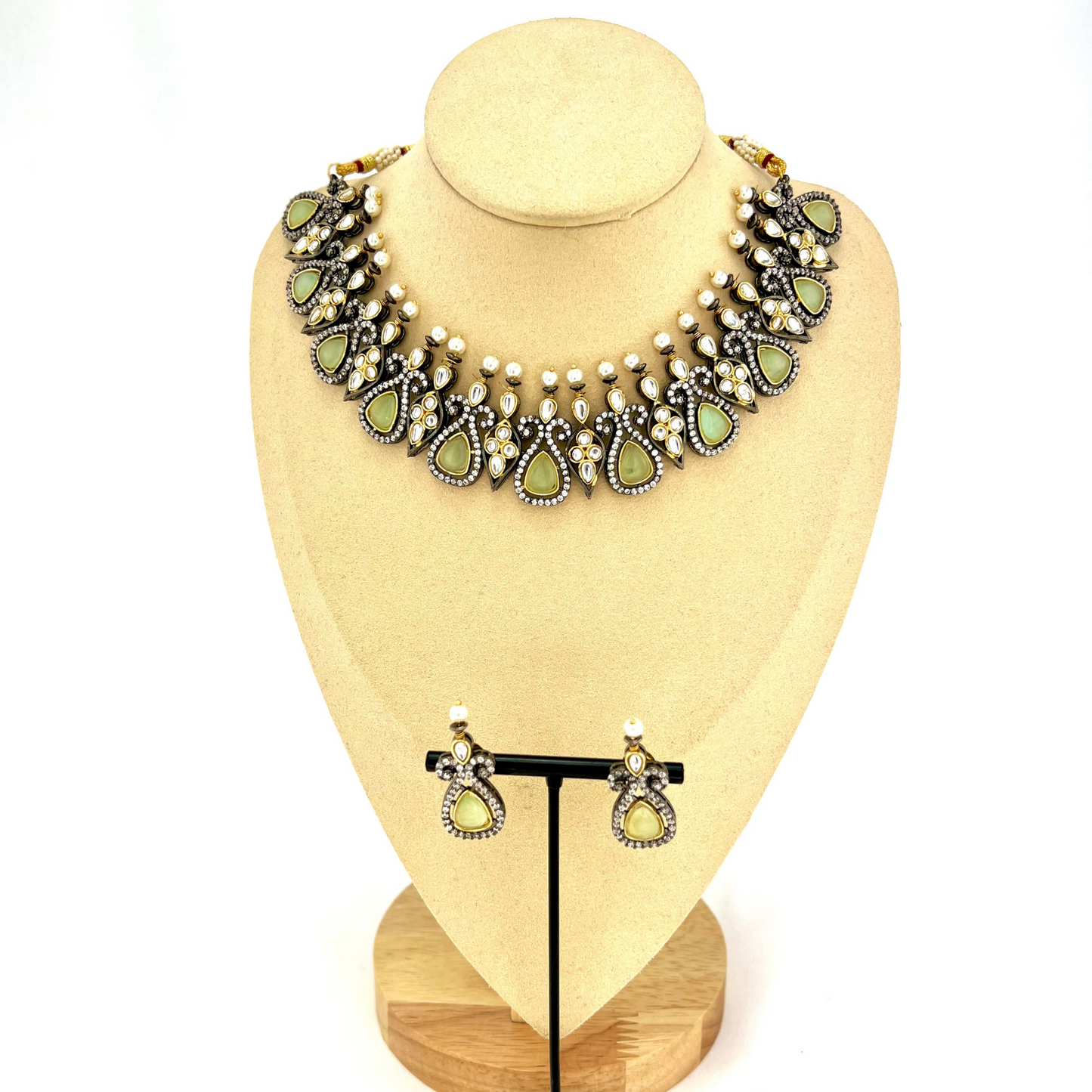 Necklace set with mint green and clear stone work. Set includes necklace and earrings. Prefect for Indian weddings, parties and special occasions. Latest 2022 fashion. High end Indian fashion jewellery with top quality stones and beads.