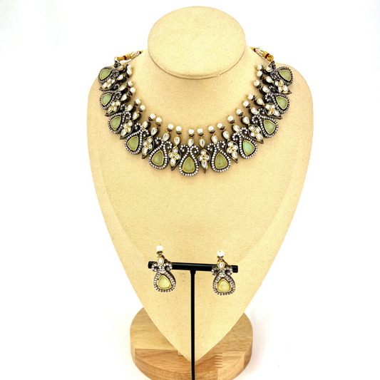 Necklace set with mint green and clear stone work. Set includes necklace and earrings. Prefect for Indian weddings, parties and special occasions. Latest 2022 fashion. High end Indian fashion jewellery with top quality stones and beads.