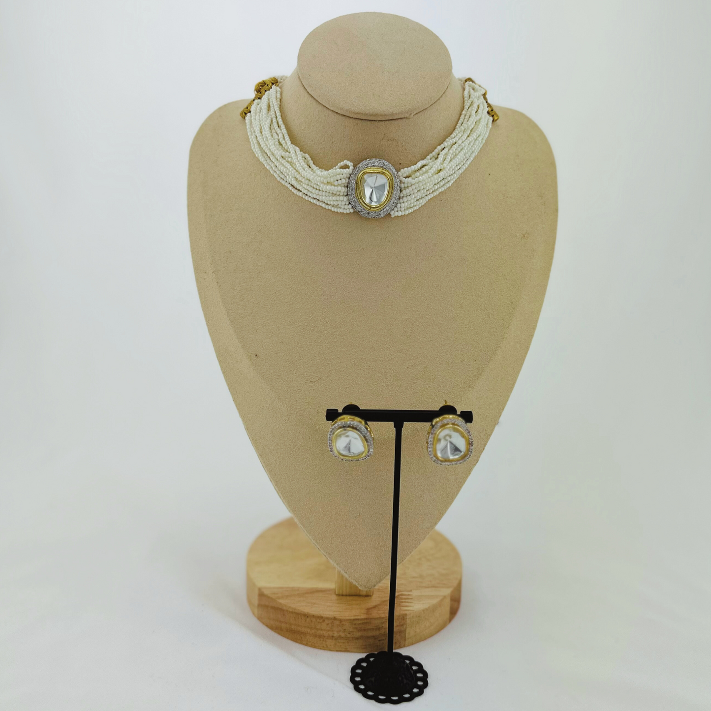 Necklace set with clear stone and white pearl beads. Set includes necklace & earrings. Prefect for Indian weddings, parties and special occasions. Latest 2023 fashion. High end Indian fashion jewellery with top quality stones and beads.