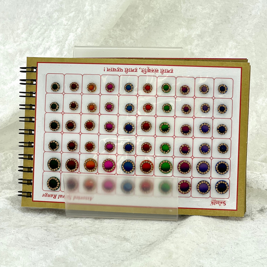 Bindi Book with gold stone work in various different shapes, sizes and colours. Prefect for Indian weddings, parties and special occasions.