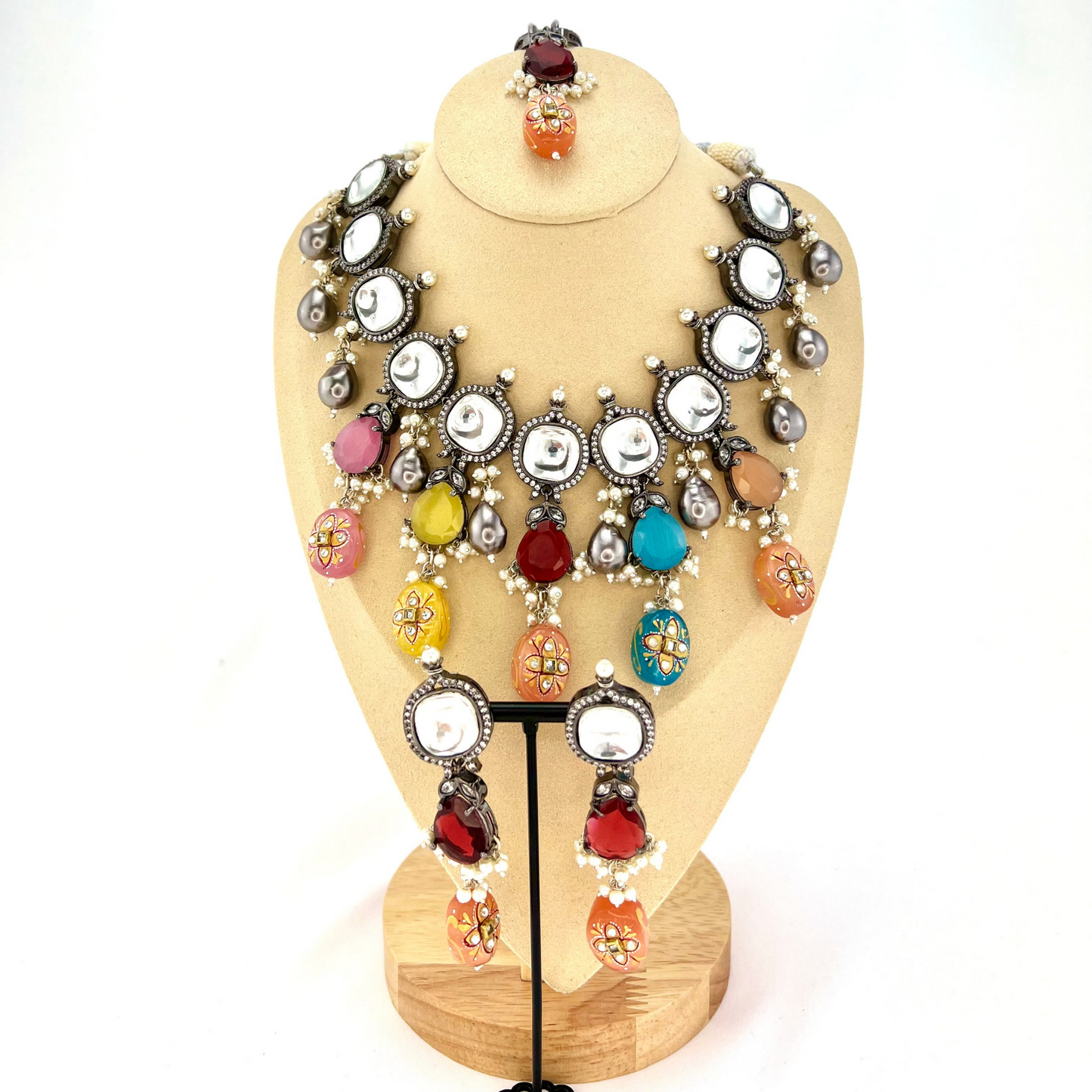 Kundan necklace set with multi colour stones and beads. Set includes necklace, tikka and earrings. Prefect for Indian parties, weddings and special occasions. Latest 2022 fashion