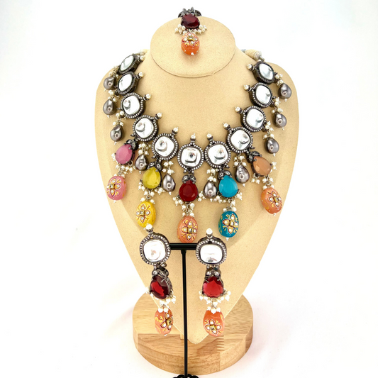 Kundan necklace set with multi colour stones and beads. Set includes necklace, tikka and earrings. Prefect for Indian parties, weddings and special occasions. Latest 2022 fashion
