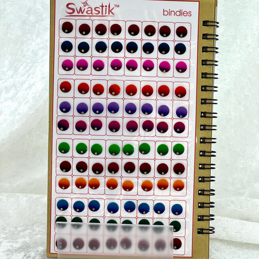 Bindi Book with single gold stone work in round shape in various different sizes and colours. Prefect for Indian weddings, parties and special occasions.