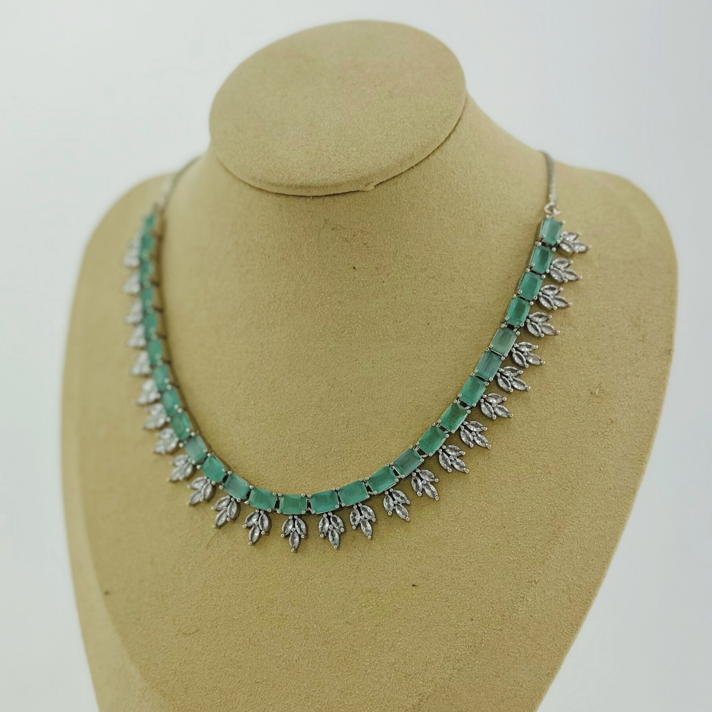Necklace set with light blue and clear stones. Set includes necklace & earrings. Prefect for Indian weddings, parties and special occasions. Latest 2023 fashion. High end Indian fashion jewellery with top quality stones and beads.