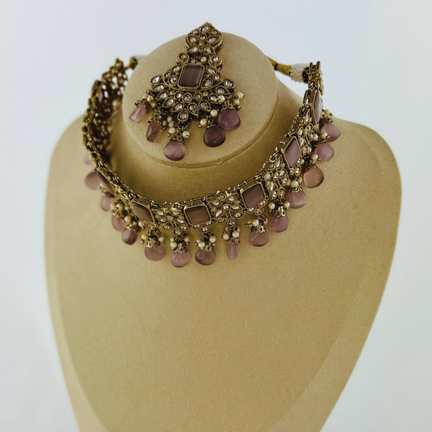 Choker set with lilac bead and stones. Set includes necklace, tikka & earrings. Prefect for Indian weddings, parties and special occasions. Latest 2023 fashion. High end Indian fashion jewellery with top quality stones and beads.