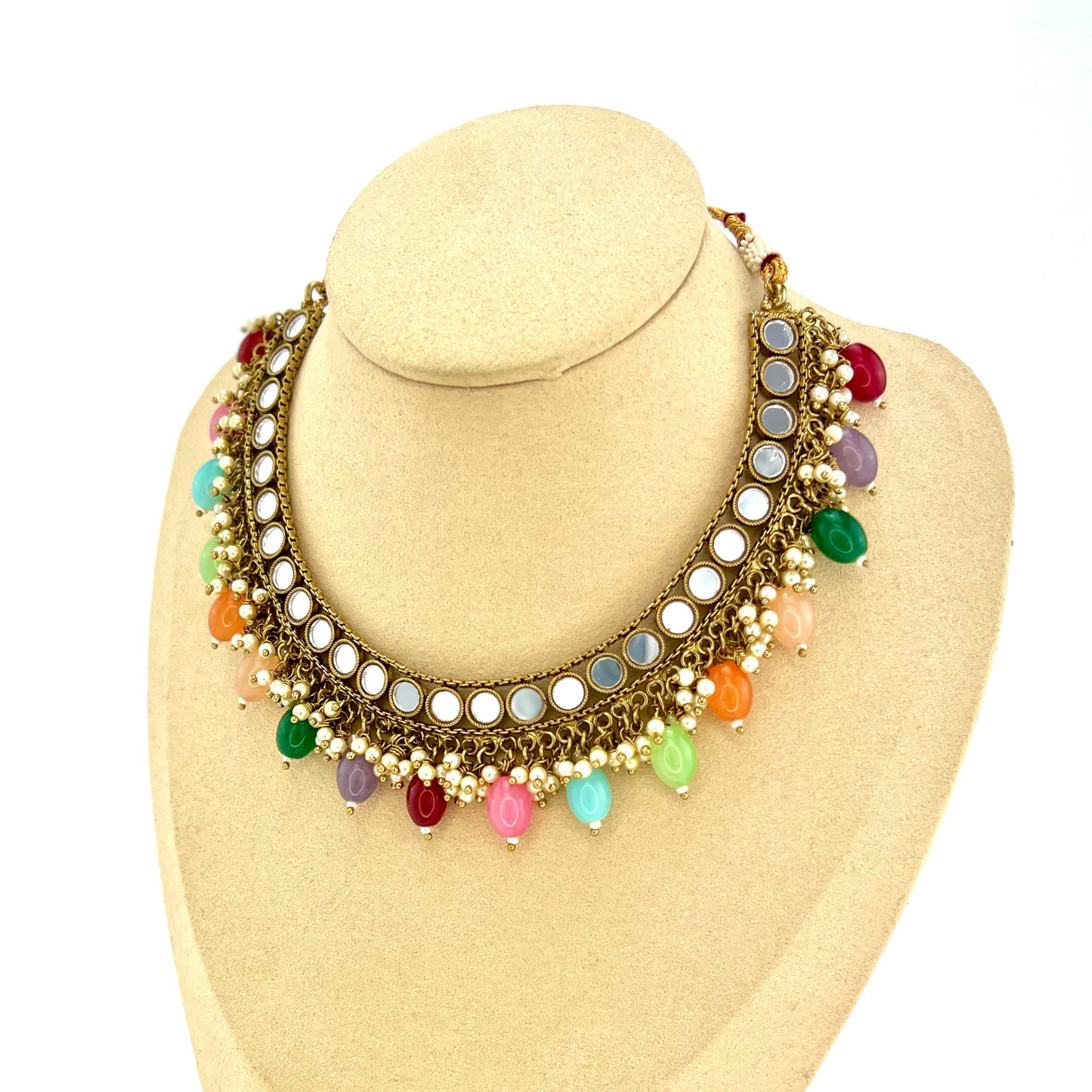 Mirror necklace set with multi colour beads and small pearls. Set includes necklace, tikka and earrings. Prefect for Indian parties, weddings and special occasions. Latest 2022 fashion