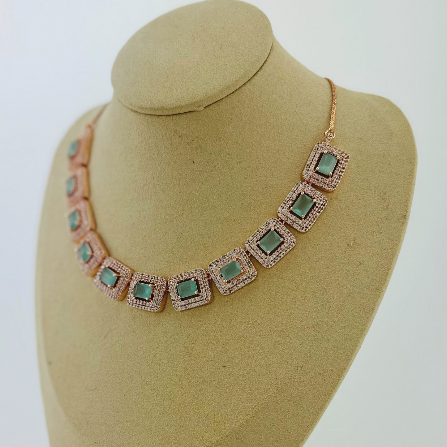 Rosegold necklace set with light blue and clear stones. Set includes necklace & earrings. Prefect for Indian weddings, parties and special occasions. Latest 2023 fashion. High end Indian fashion jewellery with top quality stones and beads.