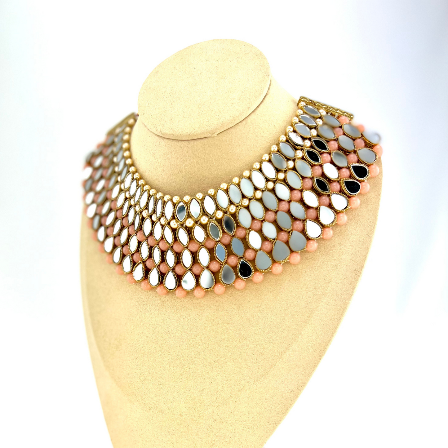 Mirror necklace set with pink beads, clear stones and pearls. Set includes, necklace, tikka and earrings. Prefect for Indian weddings, parties and special occasions. Latest 2022 fashion. High end Indian fashion jewellery with top quality stones and beads.