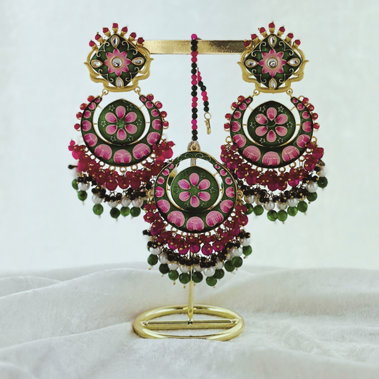 Hand painted tikka & earring set in pink, green & hot pink. High quality beads, pearls and stone work. Latest 2023 fashion for weddings, parties and special occasions