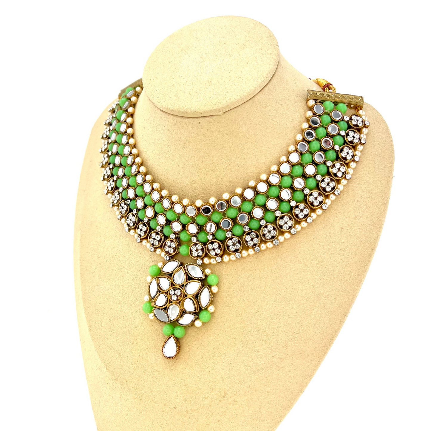 Mirror necklace set with green beads, clear stones and pearls. Set includes, necklace, tikka and earrings. Prefect for Indian weddings, parties and special occasions. Latest 2022 fashion. High end Indian fashion jewellery with top quality stones and beads.