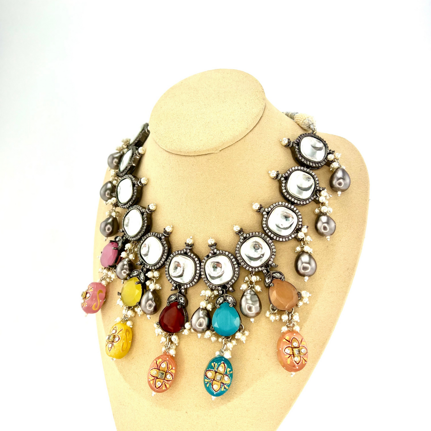 Kundan necklace set with multi colour stones and beads. Set includes necklace, tikka and earrings. Prefect for Indian parties, weddings and special occasions. Latest 2022 fashion