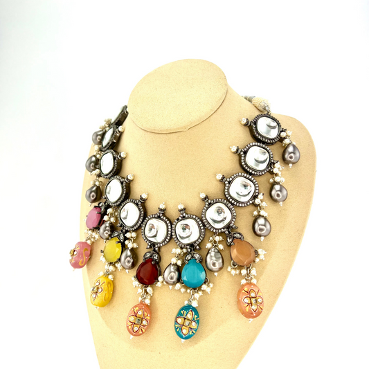 Kundan necklace set with multi colour stones and beads. Set includes necklace, tikka and earrings. Prefect for Indian parties, weddings and special occasions. Latest 2022 fashion