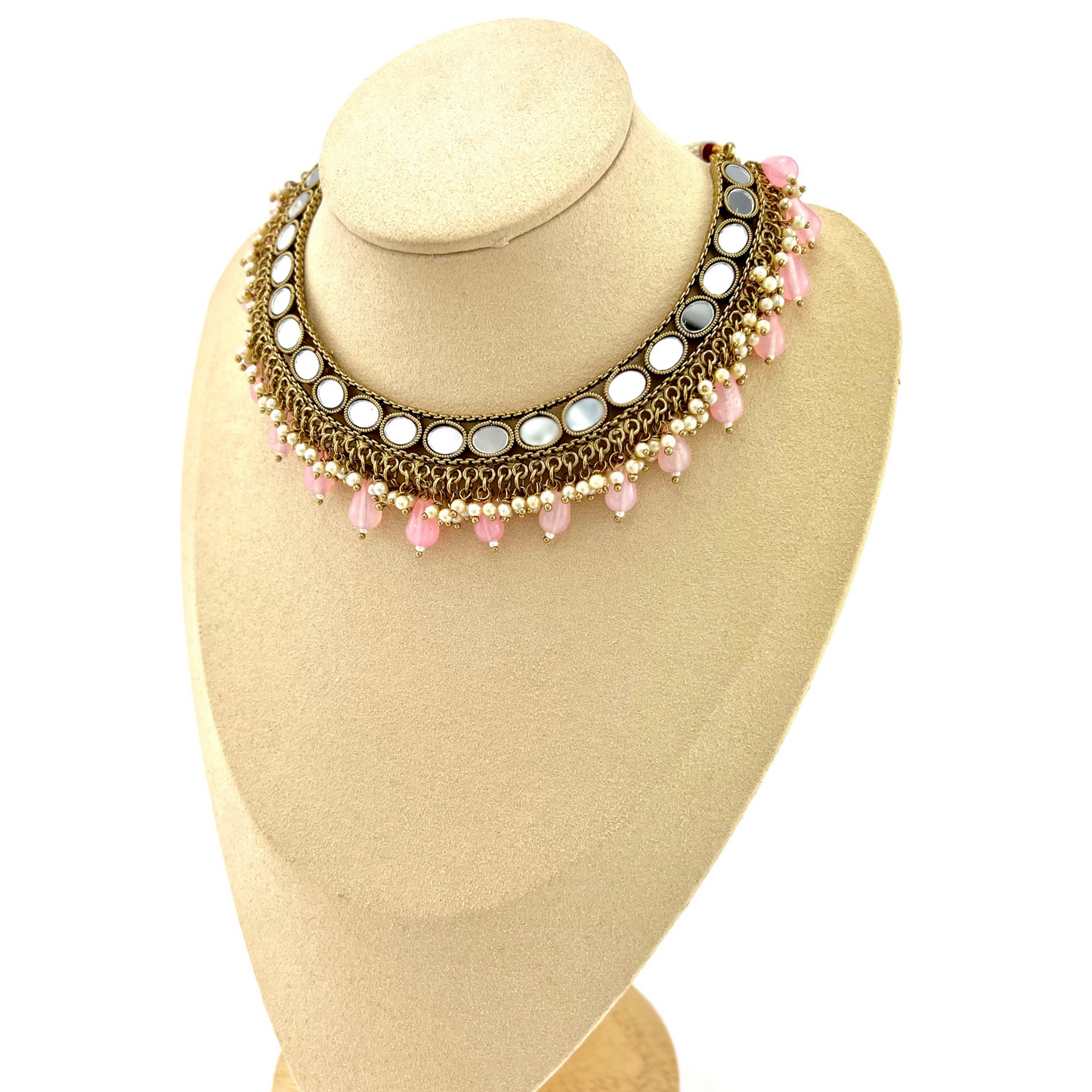 Mirror necklace set with pink beads and small white pearls. Set includes necklace, tikka and earrings. Prefect for Indian parties, weddings and special occasions. Latest 2022 fashion.