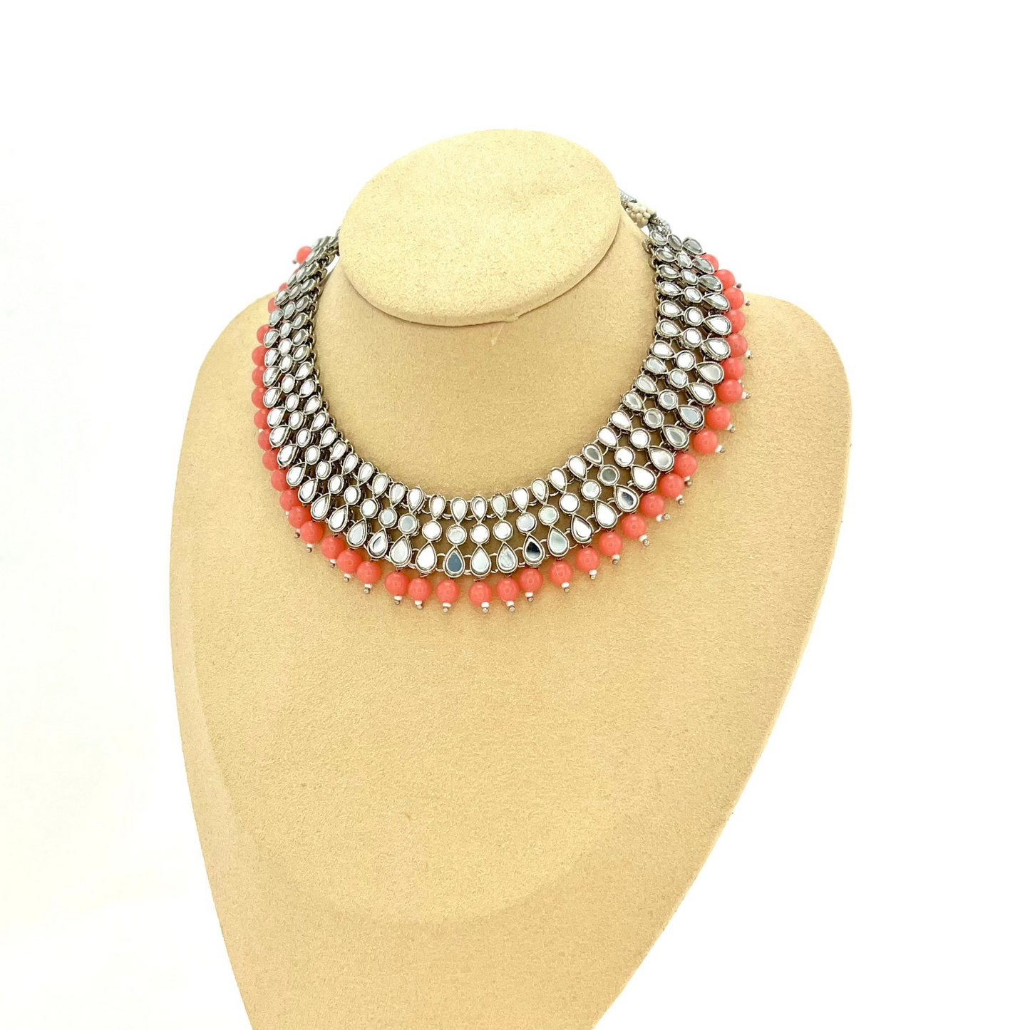 Mirror necklace set with pink beads. Set includes, necklace, tikka and earrings. Prefect for Indian weddings, parties and special occasions. Latest 2022 fashion. High end Indian fashion jewellery with top quality stones and beads.