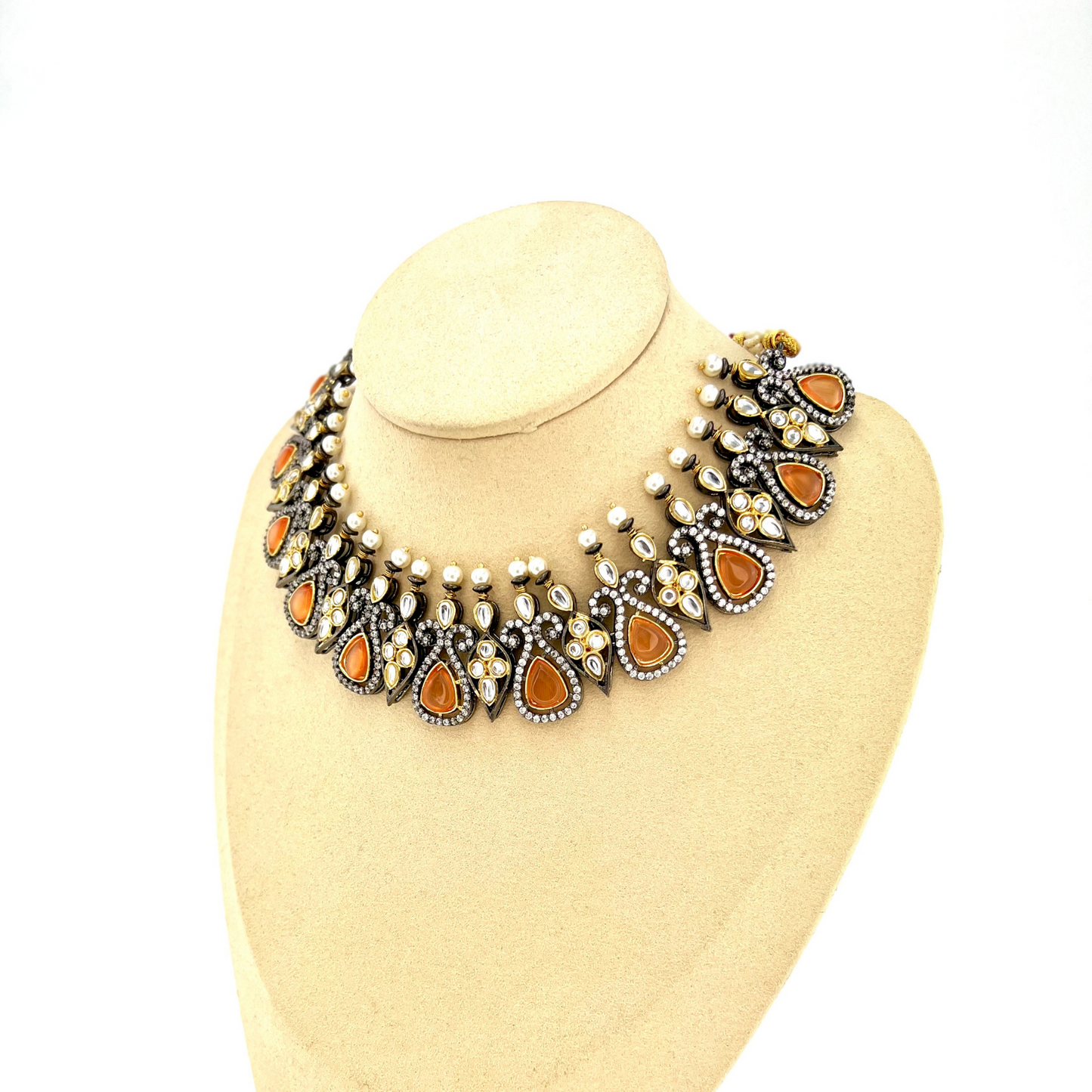 Necklace set with peach and clear stone work. Set includes necklace and earrings. Prefect for Indian weddings, parties and special occasions. Latest 2022 fashion. High end Indian fashion jewellery with top quality stones and beads.