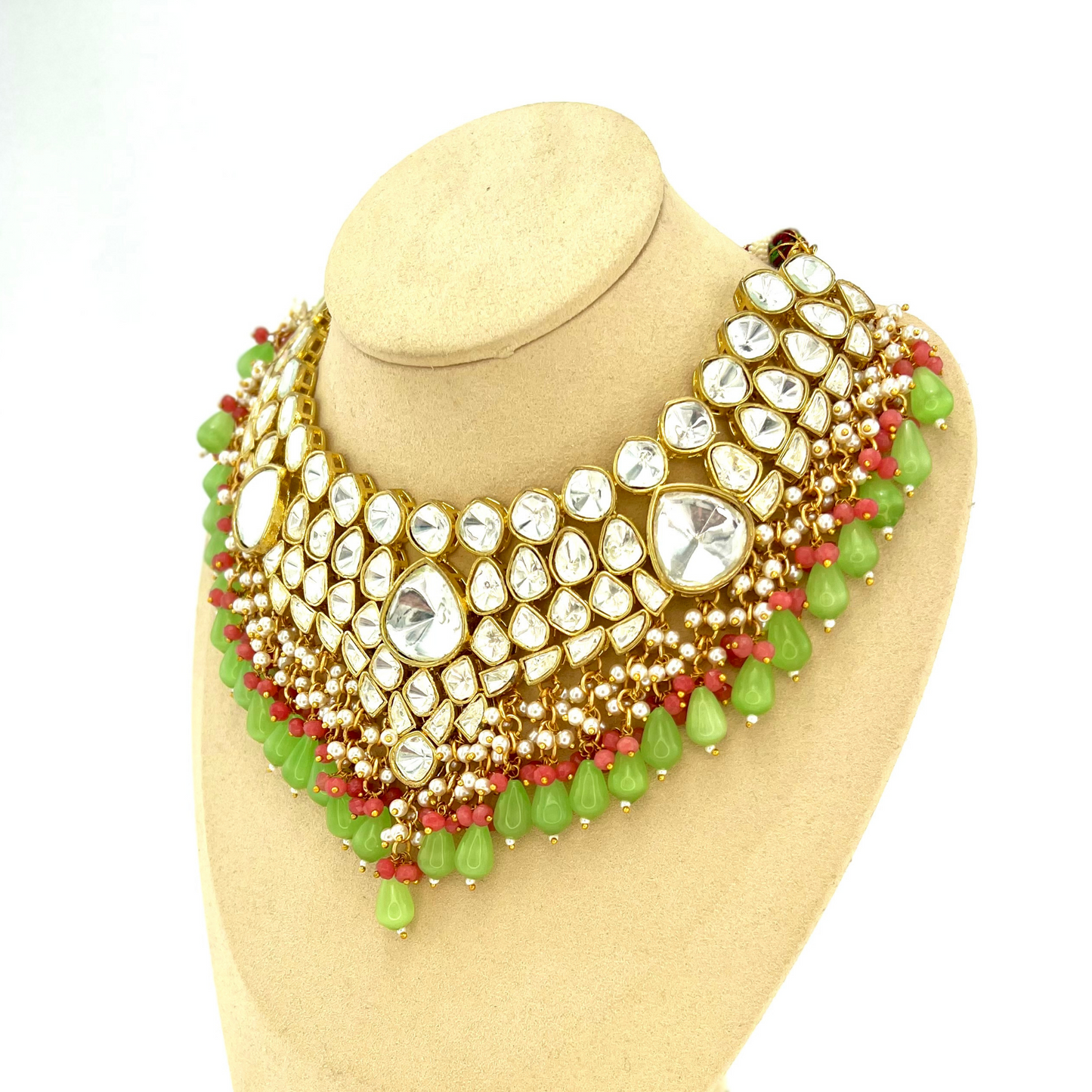 Kundan necklace set with with clear stones, green and pink beads. Set includes necklace and earrings. Prefect for Indian weddings, parties and special occasions. Latest 2022 fashion. High end Indian fashion jewellery with top quality stones and beads.