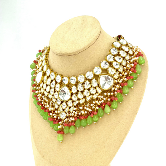 Kundan necklace set with with clear stones, green and pink beads. Set includes necklace and earrings. Prefect for Indian weddings, parties and special occasions. Latest 2022 fashion. High end Indian fashion jewellery with top quality stones and beads.