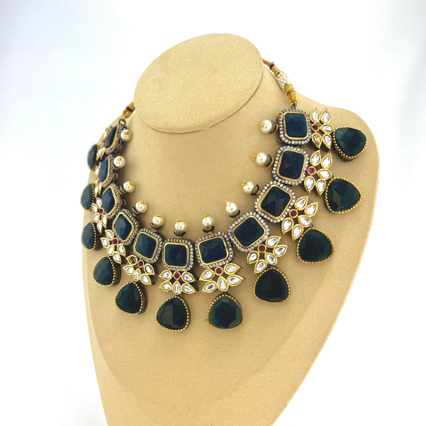 Necklace set with Navy and silver stone work finished with small white pearls. Set includes necklace, tikka and earrings. Prefect for Indian parties, weddings and special occasions. Latest 2022 fashion