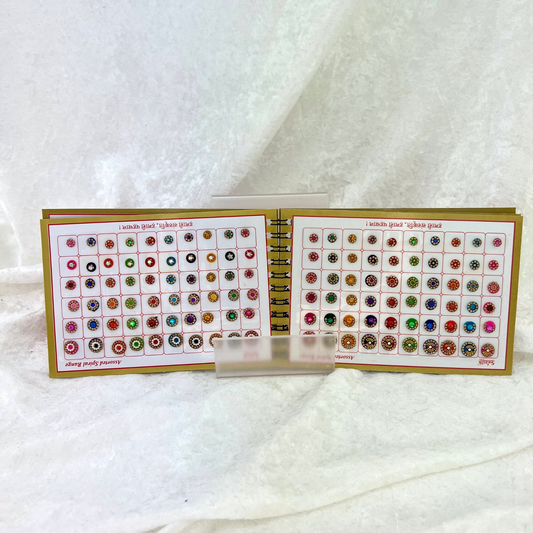 Bindi Book with gold stone work in various different shapes, sizes and colours. Prefect for Indian weddings, parties and special occasions.