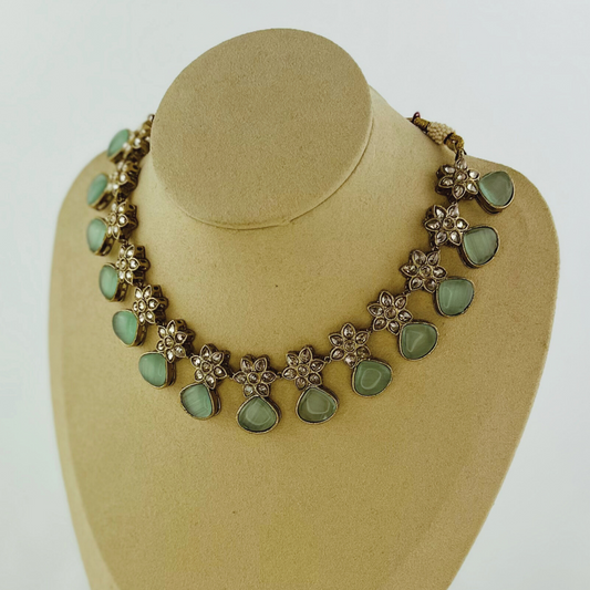 Necklace set with light blue stones. Set includes necklace & earrings. Prefect for Indian weddings, parties and special occasions. Latest 2023 fashion. High end Indian fashion jewellery with top quality stones and beads.