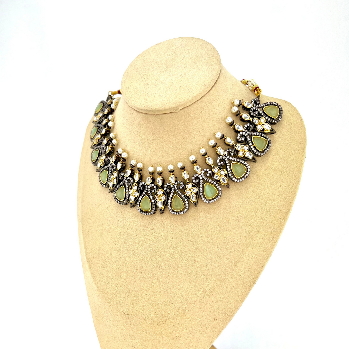 Necklace set with mint green and clear stone work. Set includes necklace and earrings. Prefect for Indian weddings, parties and special occasions. Latest 2022 fashion. High end Indian fashion jewellery with top quality stones and beads.