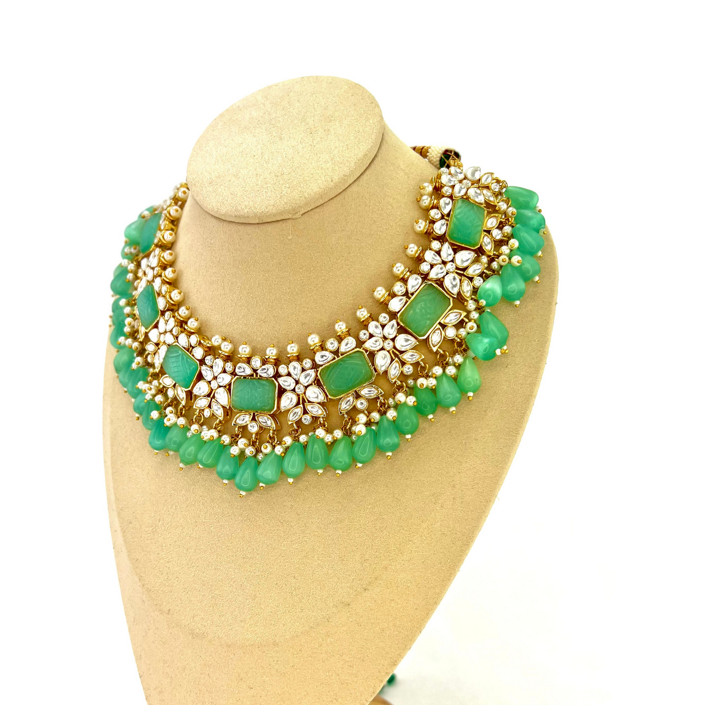 Necklace set with turquoise beads, clear and turquoise stones. Set includes necklace, tikka & earrings. Prefect for Indian weddings, parties and special occasions. Latest 2022 fashion. High end Indian fashion jewellery with top quality stones and beads.