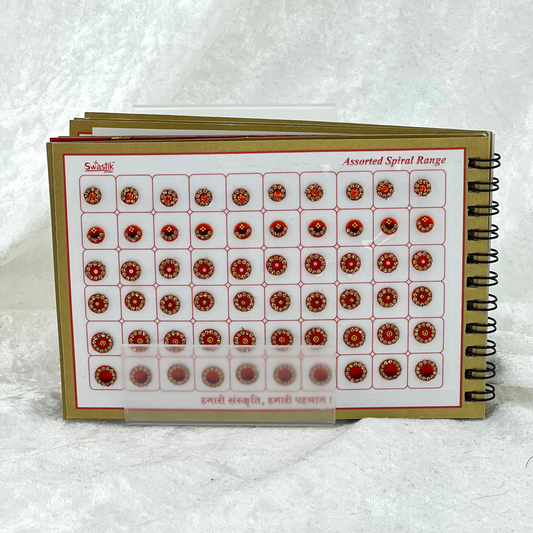 Bindi Book with gold stone work in round shape in various different sizes and colours. Prefect for Indian weddings, parties and special occasions.