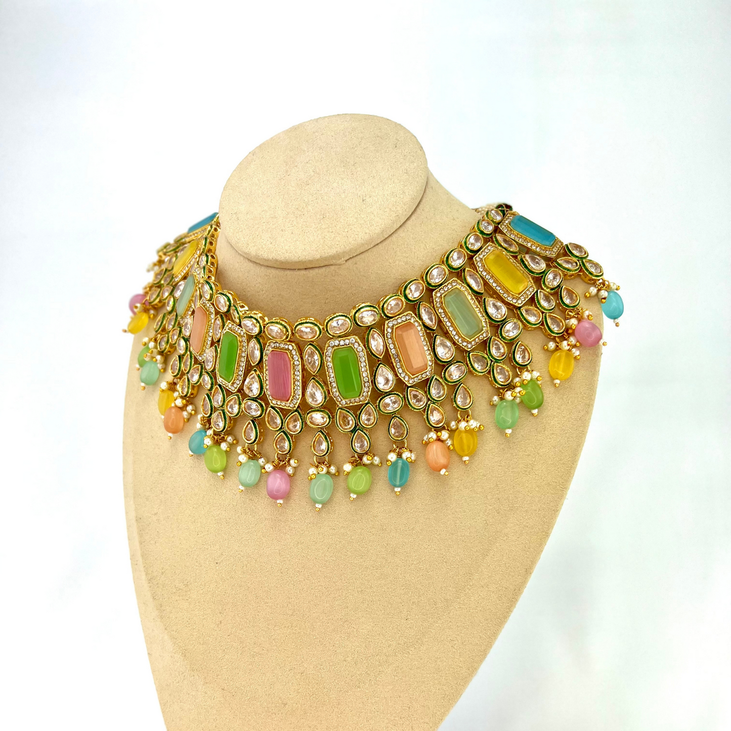Necklace set with multi colour beads and stones. Set includes necklace, tikka and earrings. Prefect for Indian weddings, parties and special occasions. Latest 2022 fashion. High end Indian fashion jewellery with top quality stones and beads.